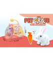 PLUSH RABBIT WITH CARROTS IN A TRANSPARENT SUITCASE