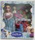 DOLL WITH SNOWMAN AND CLOTHES IN A BOX 